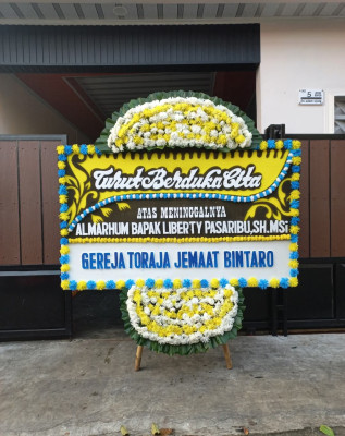 Papan Bunga Duka di Tipulu